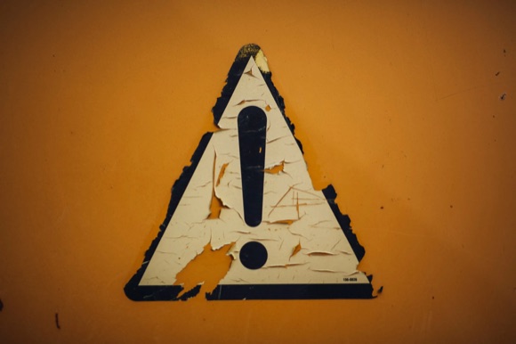 A warning sign on an industrial construction site